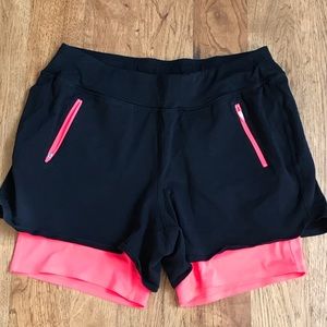 Livi Active black & bright orange exercise shorts